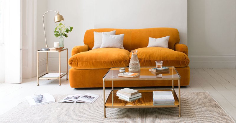 Orange velvet sofa